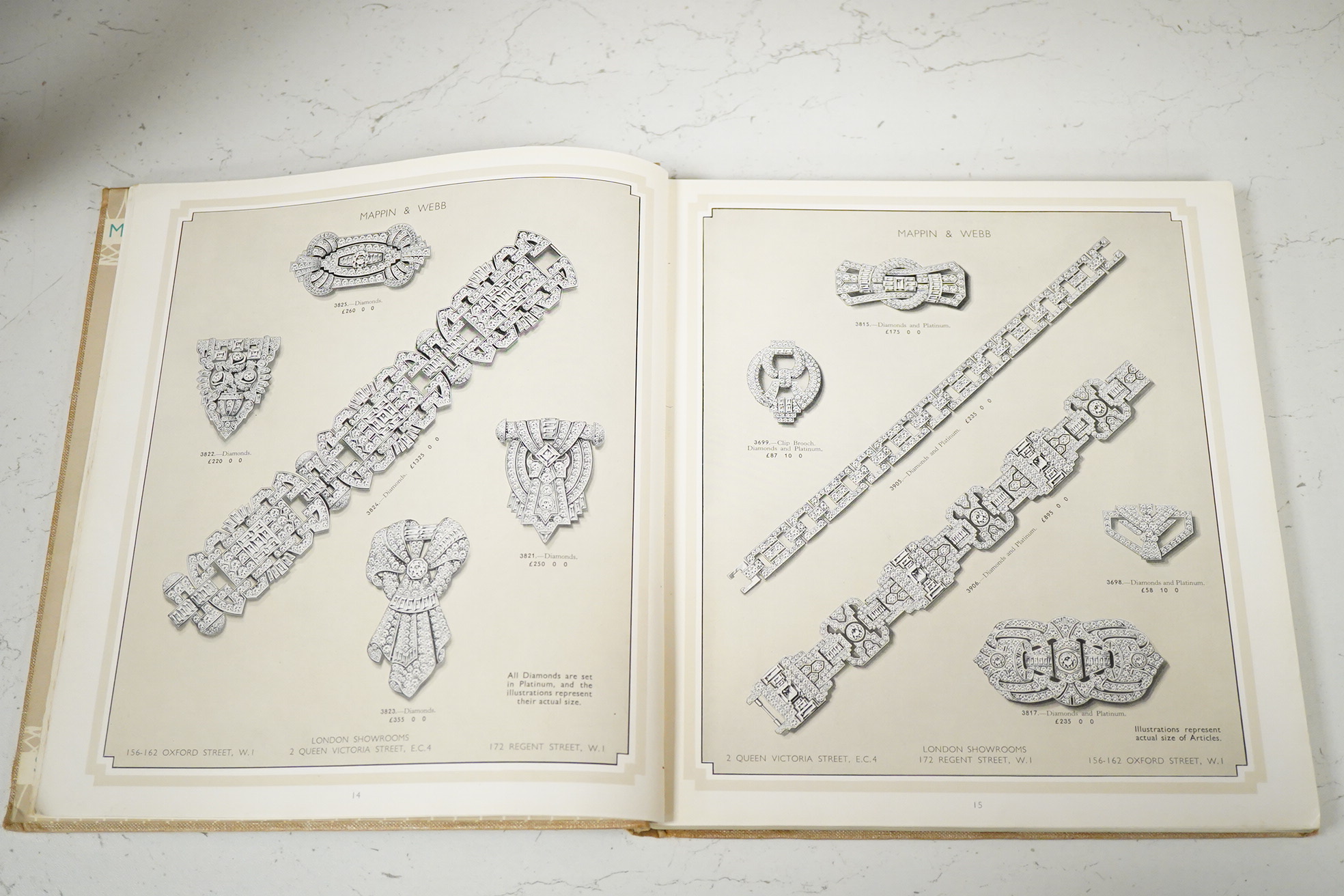 Mappin & Webb Ltd. [Catalogue]. illus. throughout (a little in colour), coloured pictorial e/ps.; original gilt cloth, 4to. (?1935); Asprey and Company Limited ... [Catalogue]. illus. throughout (num. coloured); original